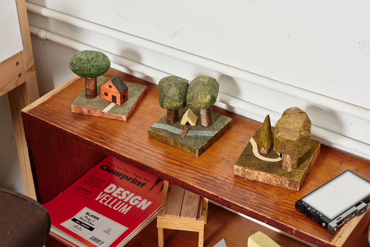 Carved and Painted Trees and Dwellings.